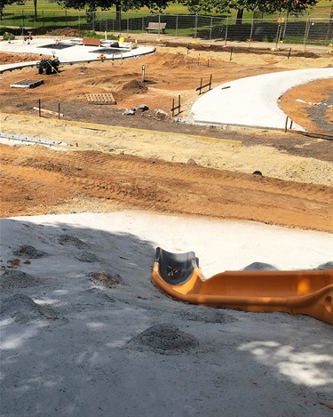 The hill slides and connecting footpaths are underway