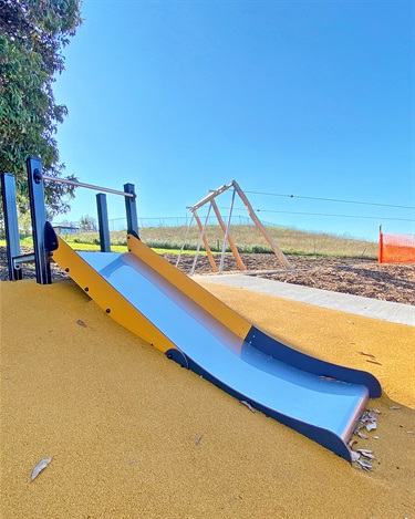 Conquer the hill slides that overlook the park.