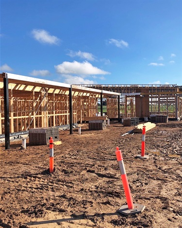 The frame of the new pavilion is well on its way to being completed, with wall and roof cladding materials on site.