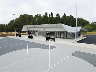 The new pavilion and netball courts following completion