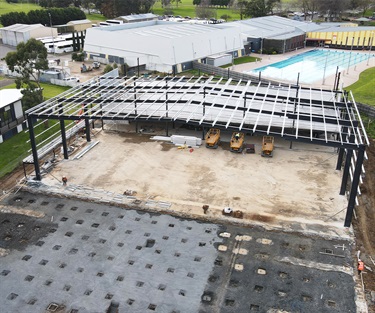 The slab and frame has been installed for the first court and ready for roofing