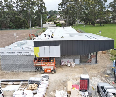 The pavilion's timber frame, along with the roofing is complete. Internal electrical fit-out, mechanical ducting for air conditioning, plaster are underway. External cladding is almost complete