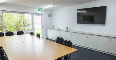 The newly constructed community meeting room is ready for use