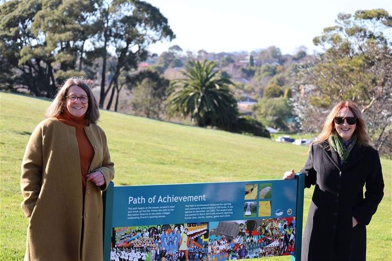 Helen Timbury and Leonie Blackwell with Path of Achievement sign